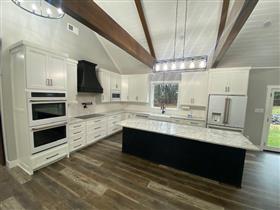 Barto, PA #2 - 14: Custom built kitchen with double wall oven, pot filler at stove.  Nice large picture window to look out at the scenery.