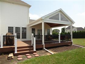 *AFTER* Side view of new deck.  Notice trapezoid windows in peak.: 