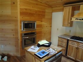 Before kitchen (stained cabinets): 